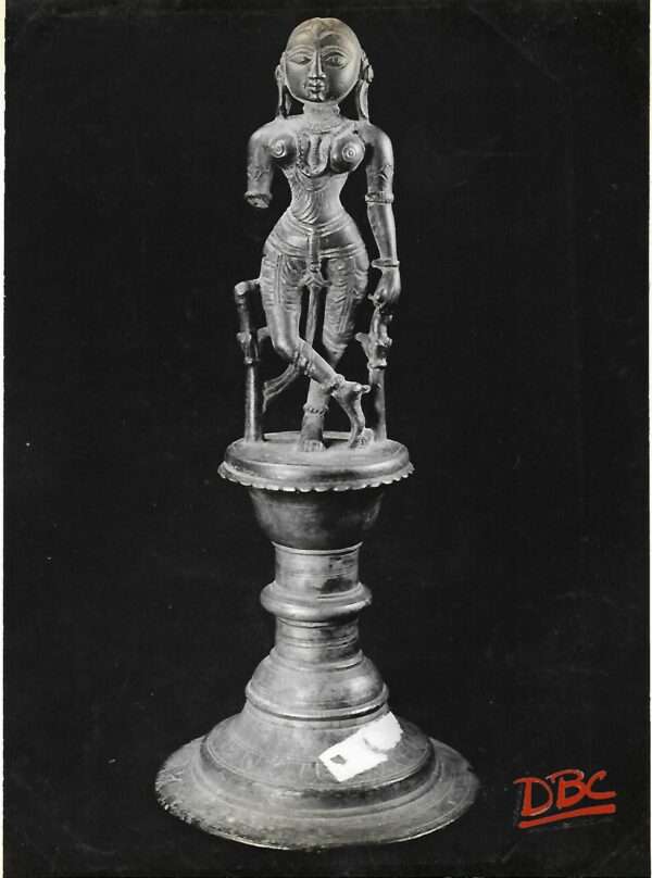 Female figure on a stand