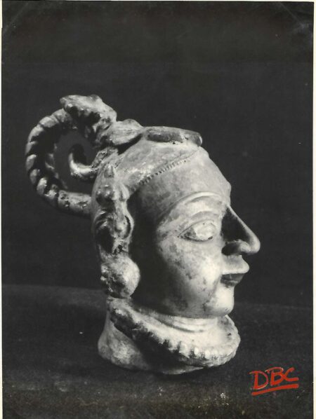 Brass head of a figure