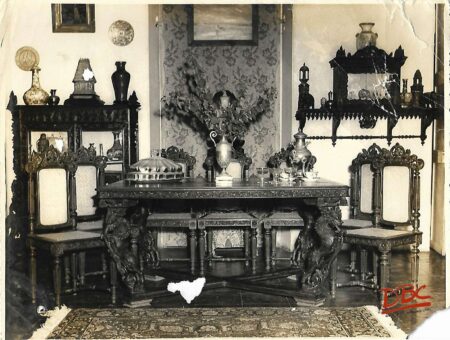 Dinning - Decorated with a Dining Table in the Centre Surrounded by Chairs on one side is a Cupboard and on the oher is an almira
