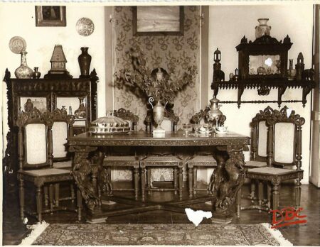 Dinning - Decorated with a Dining Table in the Centre Surrounded by Chairs on one side is a Cupboard and on the oher is an almira