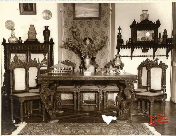 Dinning - Decorated with a Dining Table in the Centre Surrounded by Chairs on one side is a Cupboard and on the oher is an almira