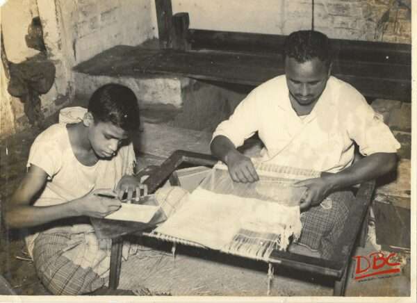 MD IRHAK GIVING LRIMING TO A BOY