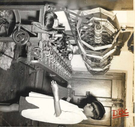 boy working on a textile machine