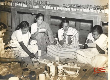 woman colouring jars dolls etc shartiniketa