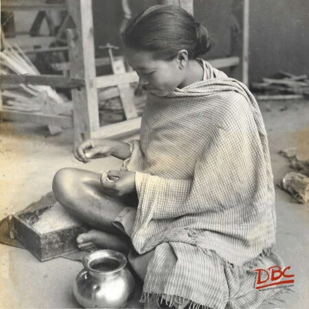 manipuri woman making threads