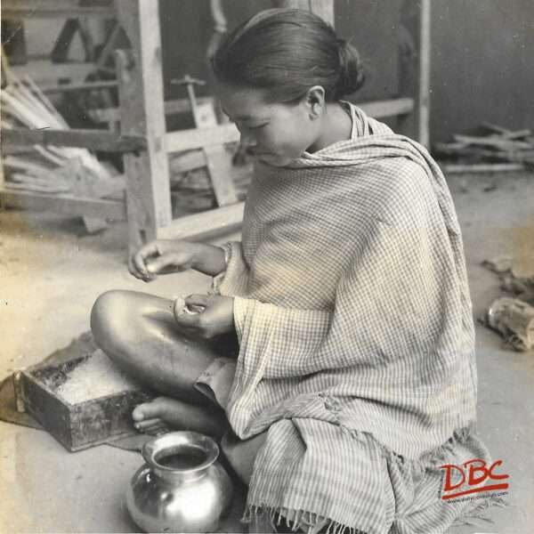 manipuri woman making threads