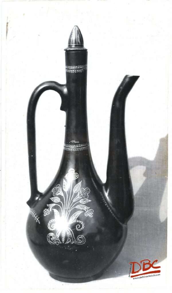 laxquer water jug with white floral design