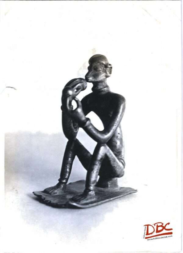 seated mombay eating some thing (tribalast ) brass