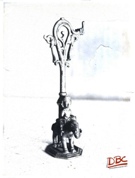 small rider on elephant in front of a decoration stand (brass) south india