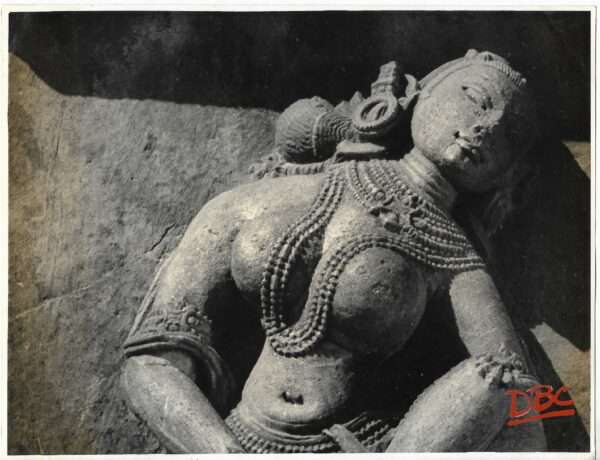Markanda : A Female Figure Putting on an Ankeetin Her Leg