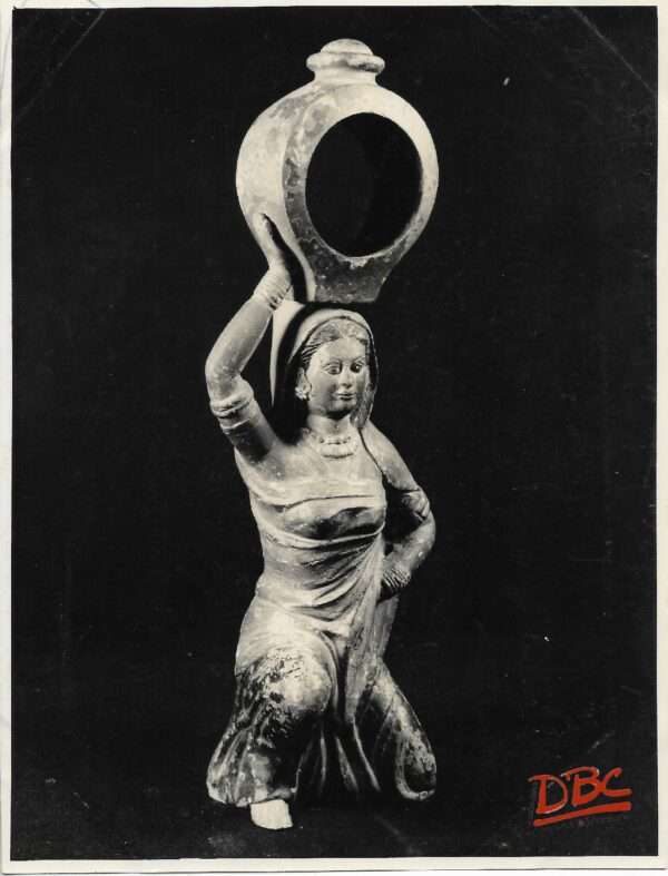 Woomen Carrying Pitcher