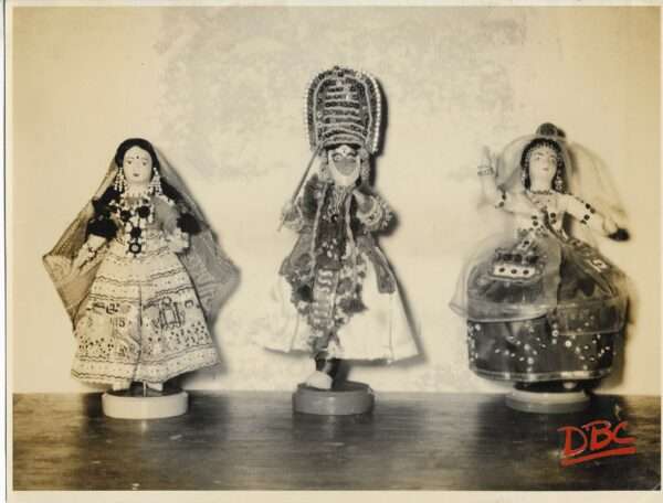 Three Dolls