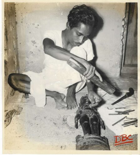 A Craftsman Prepaing Wooden Fig.