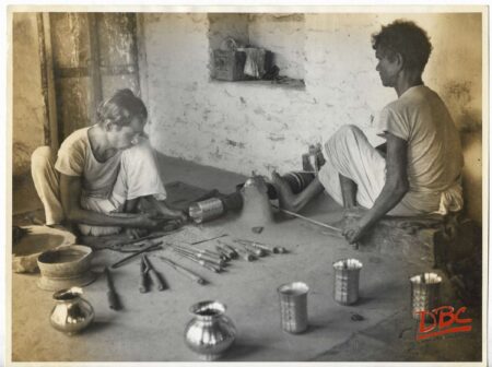 Two Craftsman Working on Bras Utensils