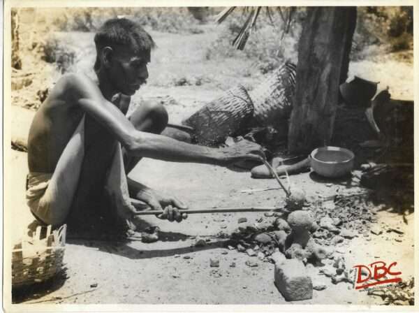 A Craftsman Having Metalic Hand in His Hand