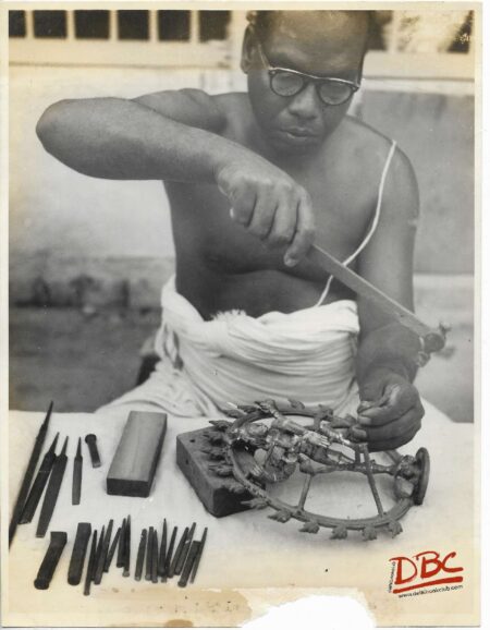 A Craftsman Working on a Figure cire Perdue Casting
