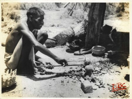 A Craftsman Working With His Tools