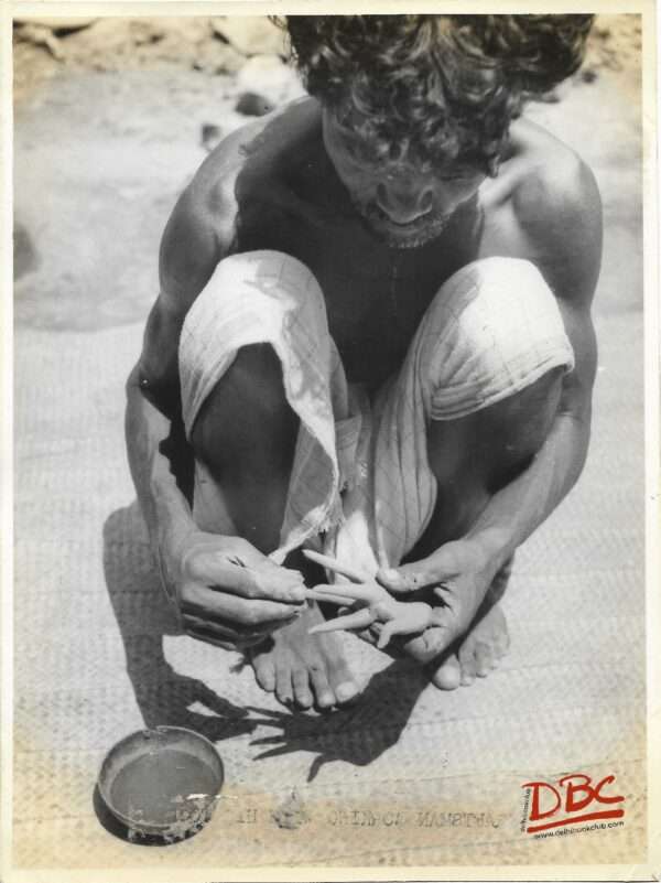 A Craftsman Preparing a Clay Model