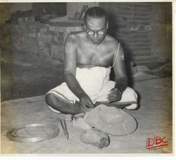 A Craftsman Work With His Tools