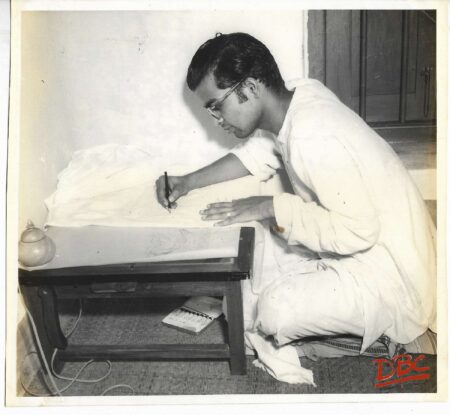 A Craftsman Drawing Some Design By Pencil