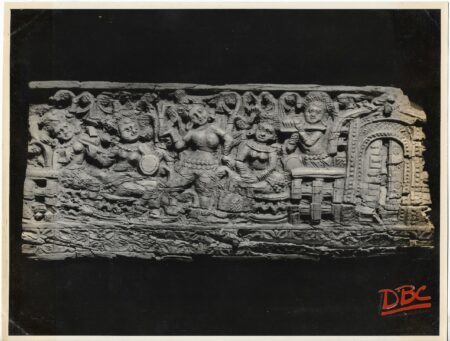 An Arch Gateway Depicting A Dancing Scene