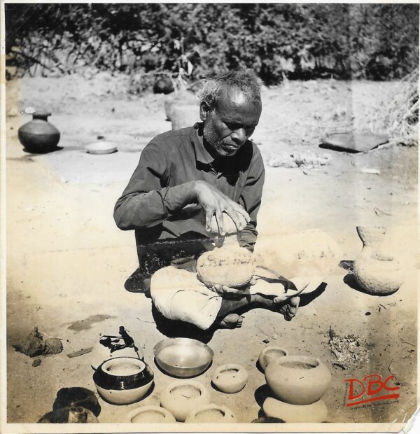 A Craftsman Preparing Mould For Metal Casting