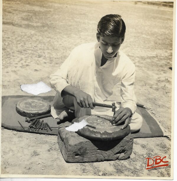 Craftsman Preparing Clay Moulds