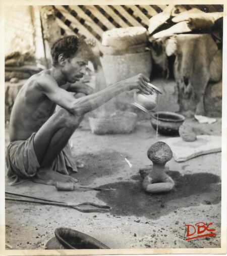 A Craftsman Washing his Tools