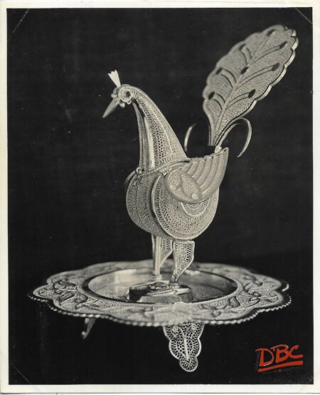 A Peacock Standing on a Star - Shaped Tray Jali Work in Silk
