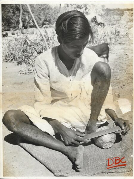 A Craftsan Preparing Clay - Models