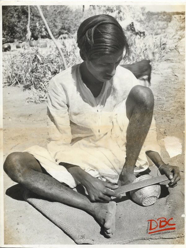 A Craftsan Preparing Clay - Models