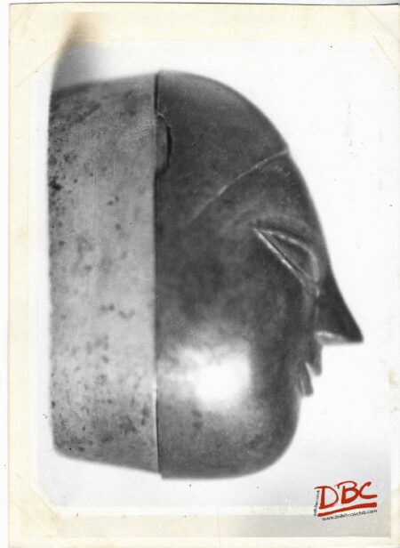 A Metalic Ash - Tray With a Lid Having Human Shape