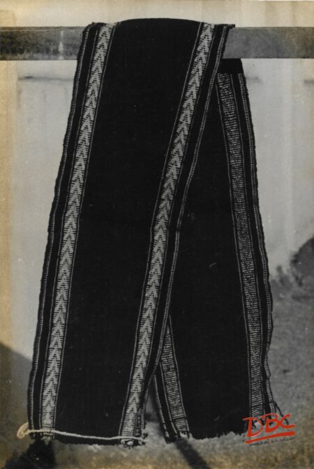Resa - Mufu - Boh - U - Sukhona Chocolte Coloured Course Breast Band With Blue Stripes in the Middle And White Stripes on the Borders Designed With The Spot Which is Found in the tomock of Sparrow Used By The Women
