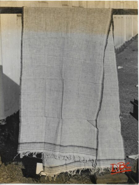 Panchi A Piece of White Cotton Cloth With Black Cheeks All Over th Body And Chocolate Border at Both Ends Used As an Upper Garments By The Santal Women