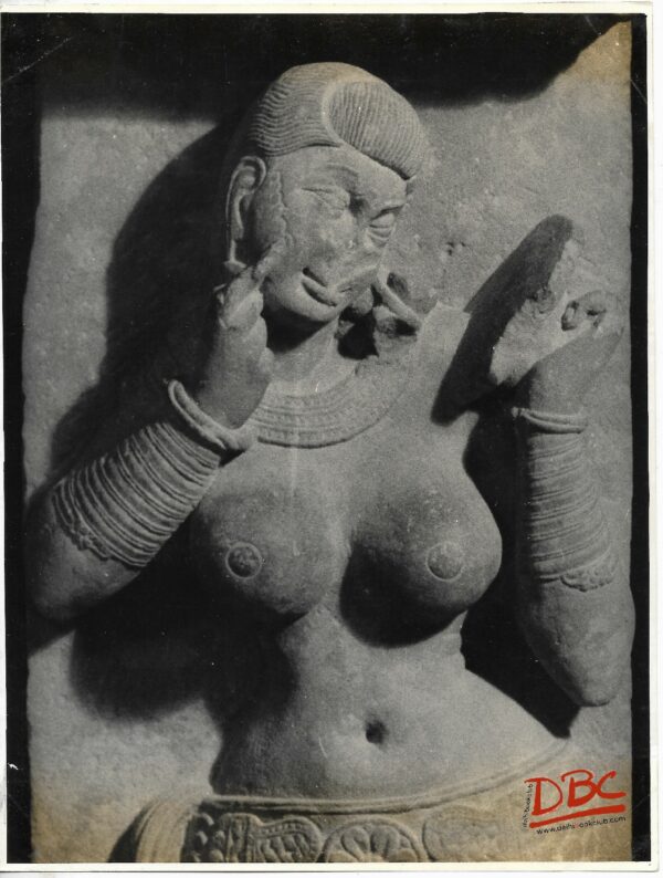 Mathura Museum Lady Applying Perfume on Her Face With Help of a Mirror