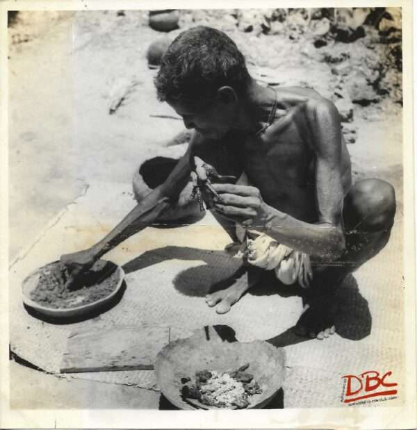 A Craftsman Working With His Tools